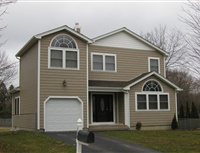 House with home addition with garage